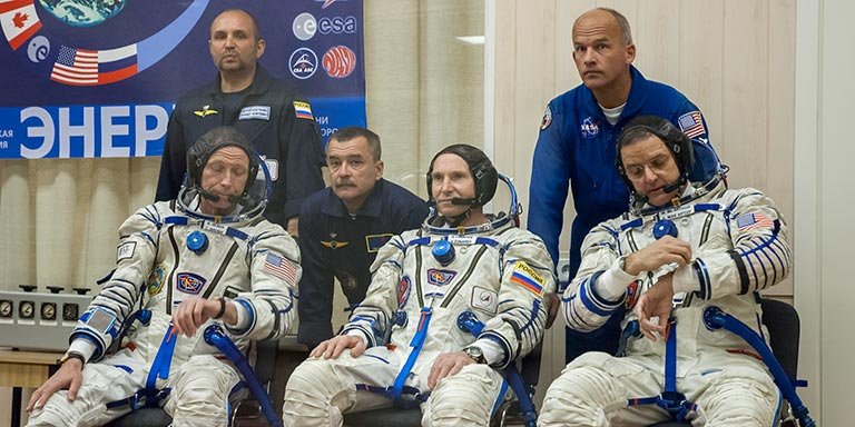 The crew of Soyuz TMA-7 on the day of lift-off